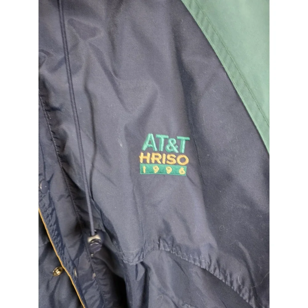 vintage 1996 AT&T Hriso nylon windbreaker jacket in a navy blue and teal...
